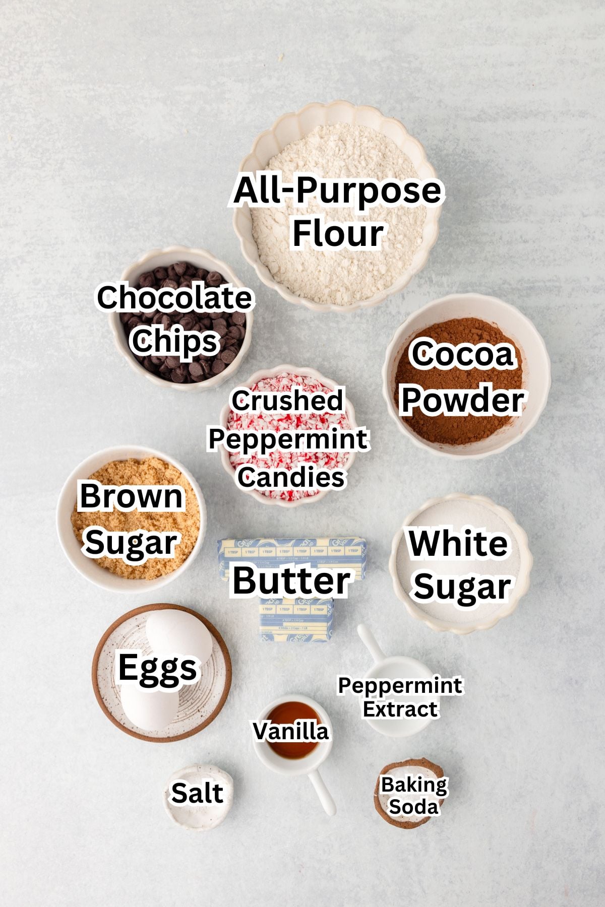 All-purpose flour, cocoa powder, chocolate chips, crushed peppermint candies, brown sugar, white sugar, eggs, butter, vanilla, salt, baking soda, peppermint extract.