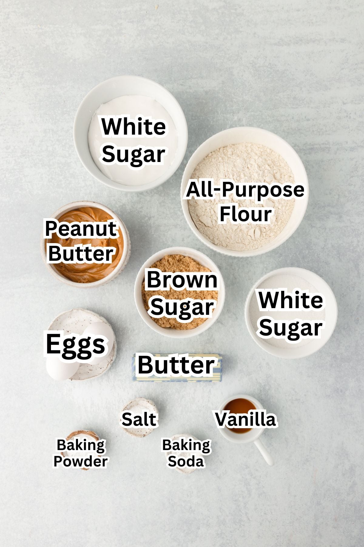 White sugar, all-purpose flour, peanut butter, eggs, brown sugar, butter, vanilla, baking powder, baking soda, salt.