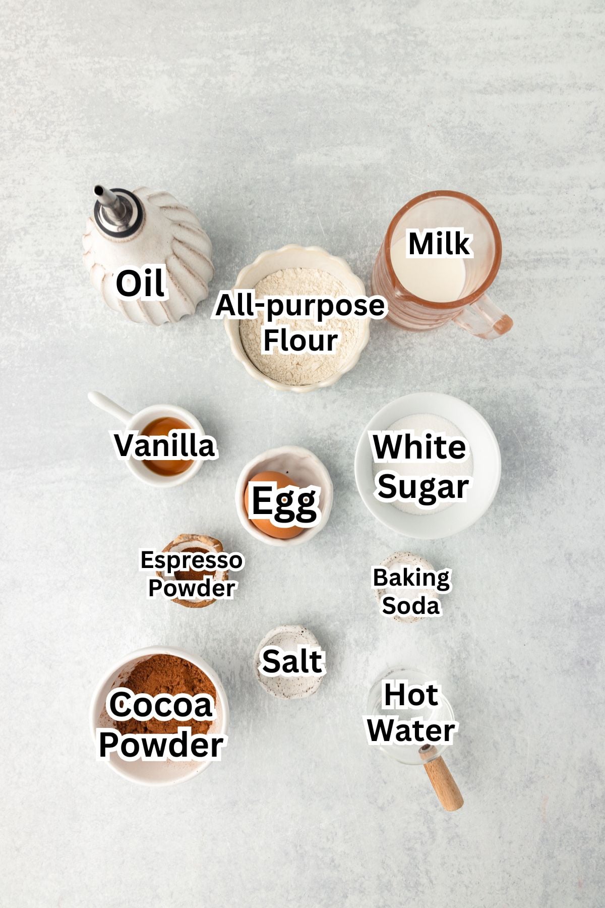 Chocolate cupcake with ingredients for baking.