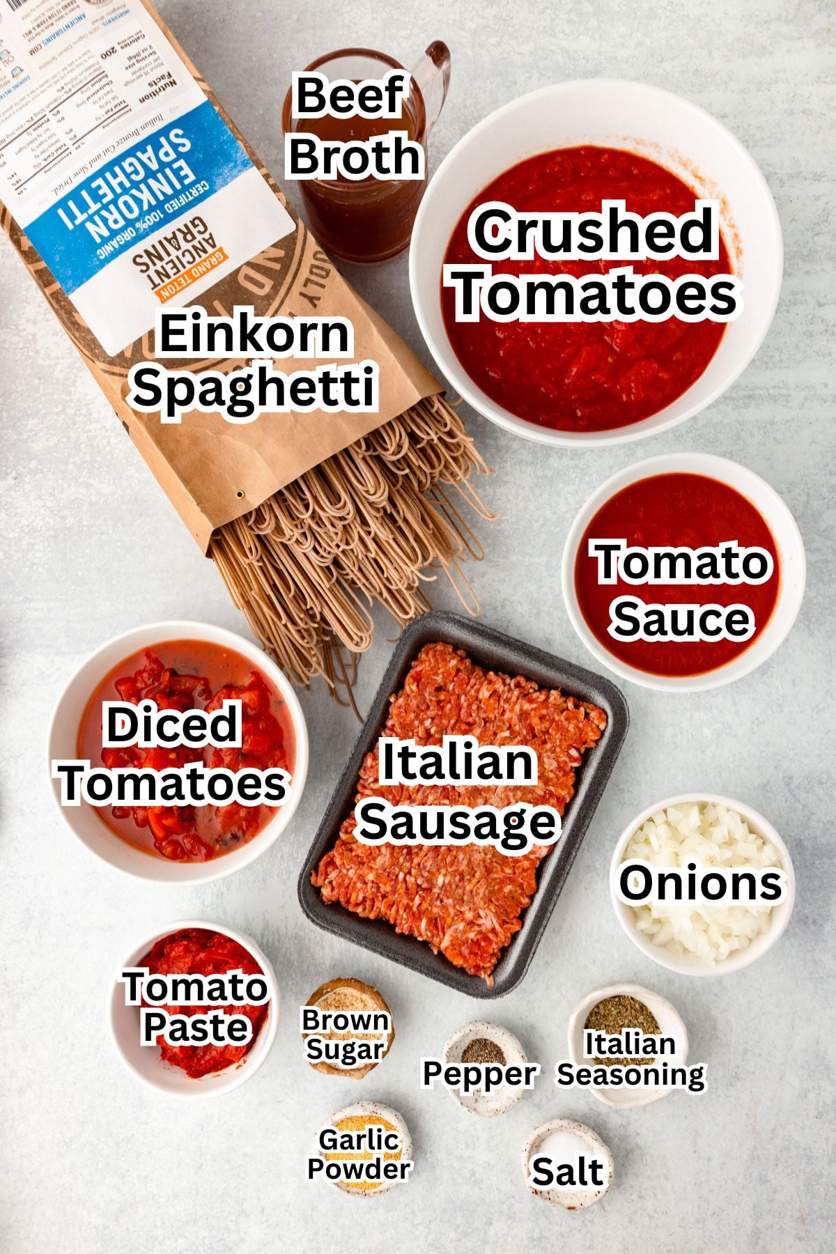 Delicious Italian sausage spaghetti with crushed tomatoes and fresh ingredients.