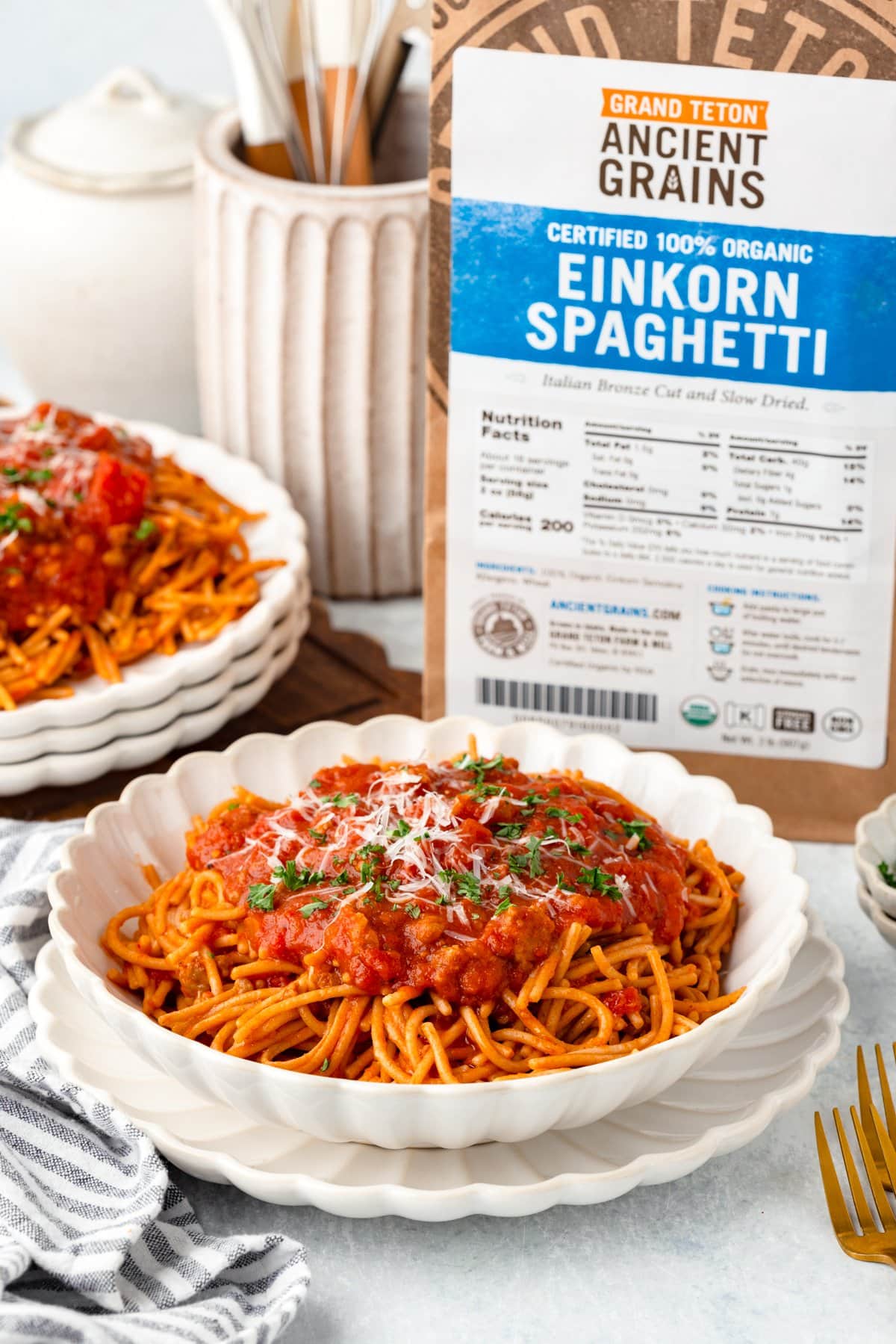 Delicious Italian sausage spaghetti with rich tomato sauce and melted cheese.