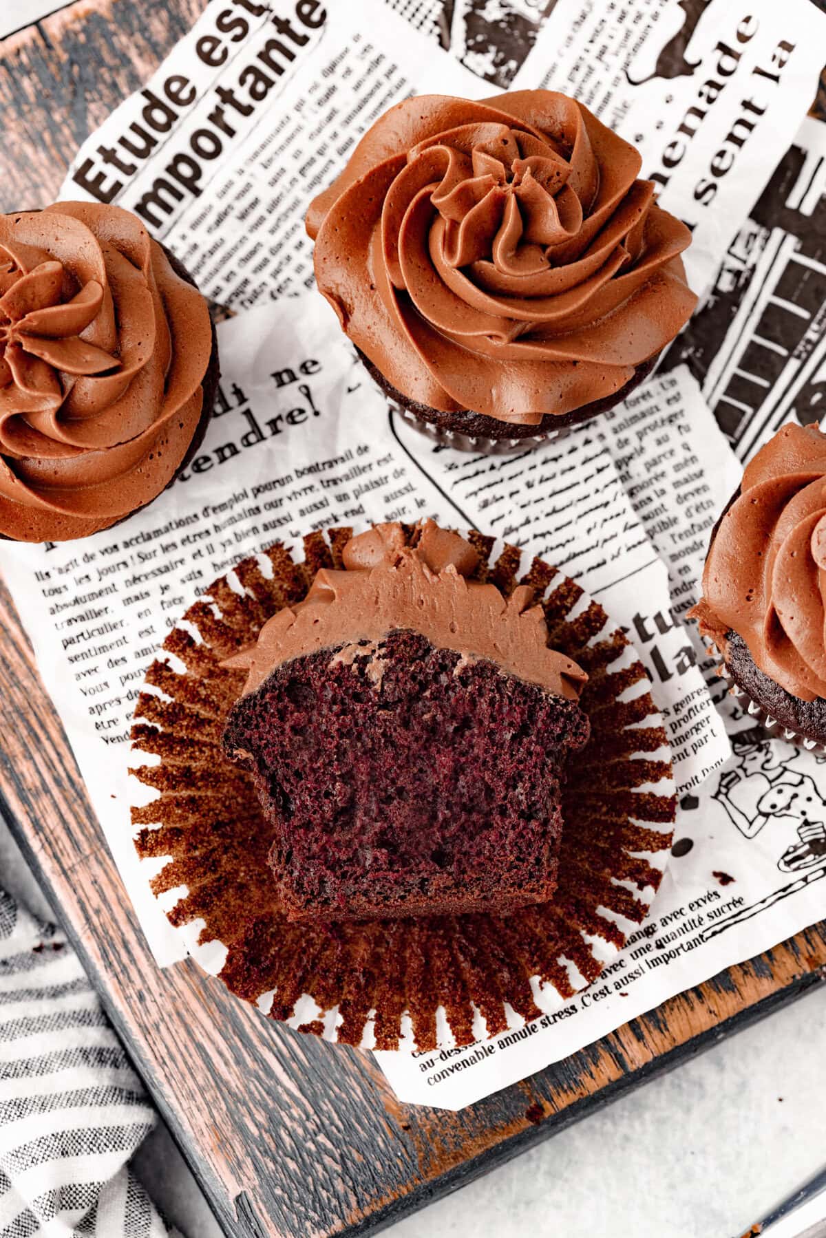 Small batch chocolate cupcakes with creamy frosting for a delicious treat.