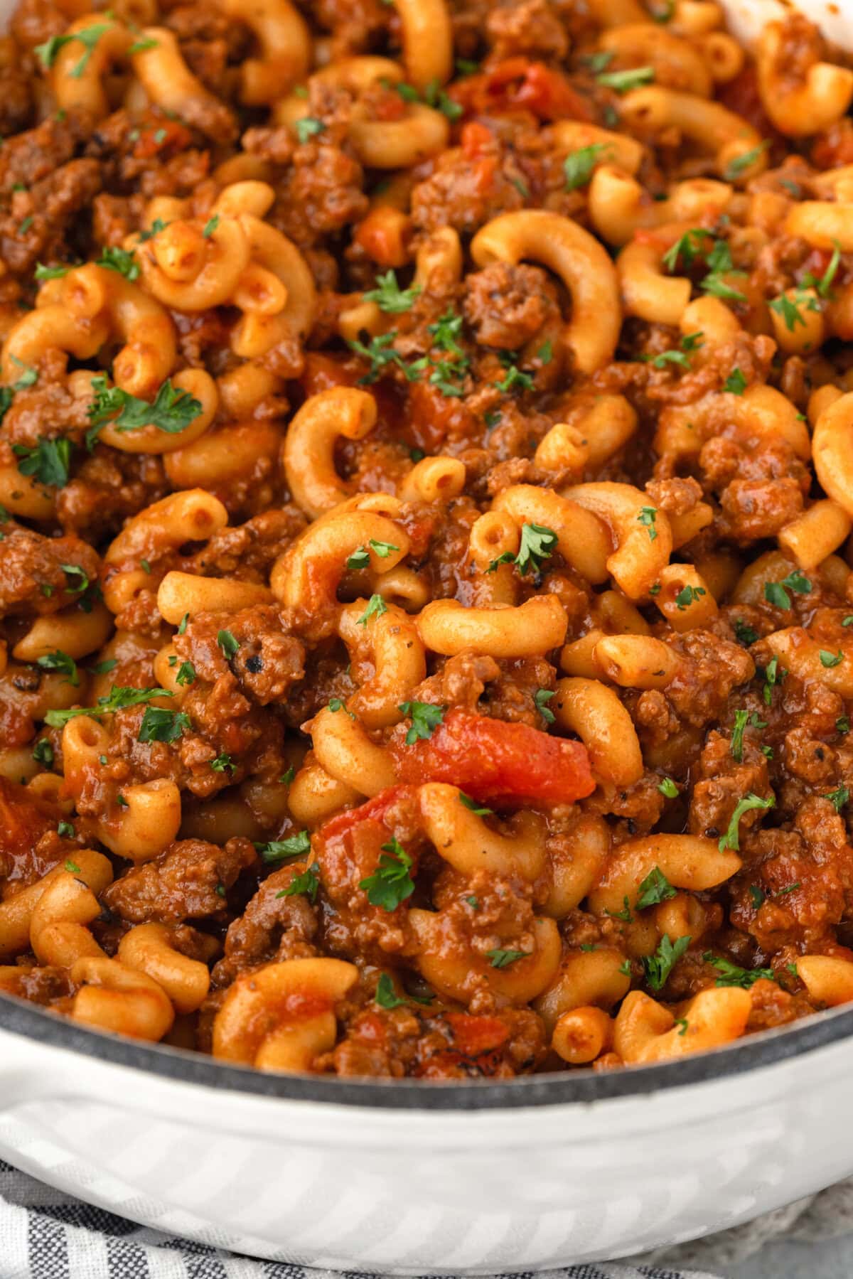 Delicious creamy American Goulash with seasoned ground beef and pasta. Perfect for a hearty, easy we.