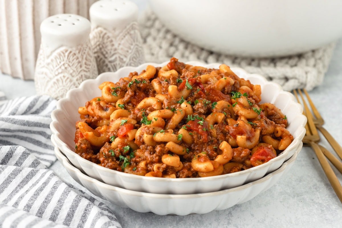 Delicious American Goulash with tender pasta, seasoned ground beef, and rich tomato sauce, perfect f.