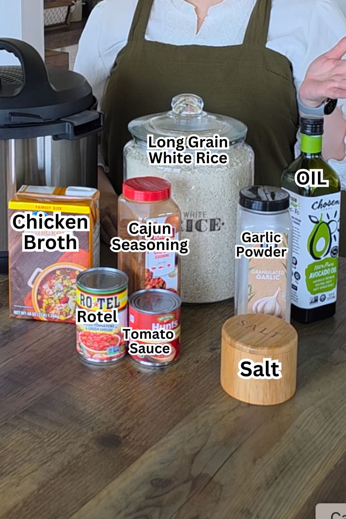 Creamy Mexican Rice with chicken broth and seasonings, ready to cook.