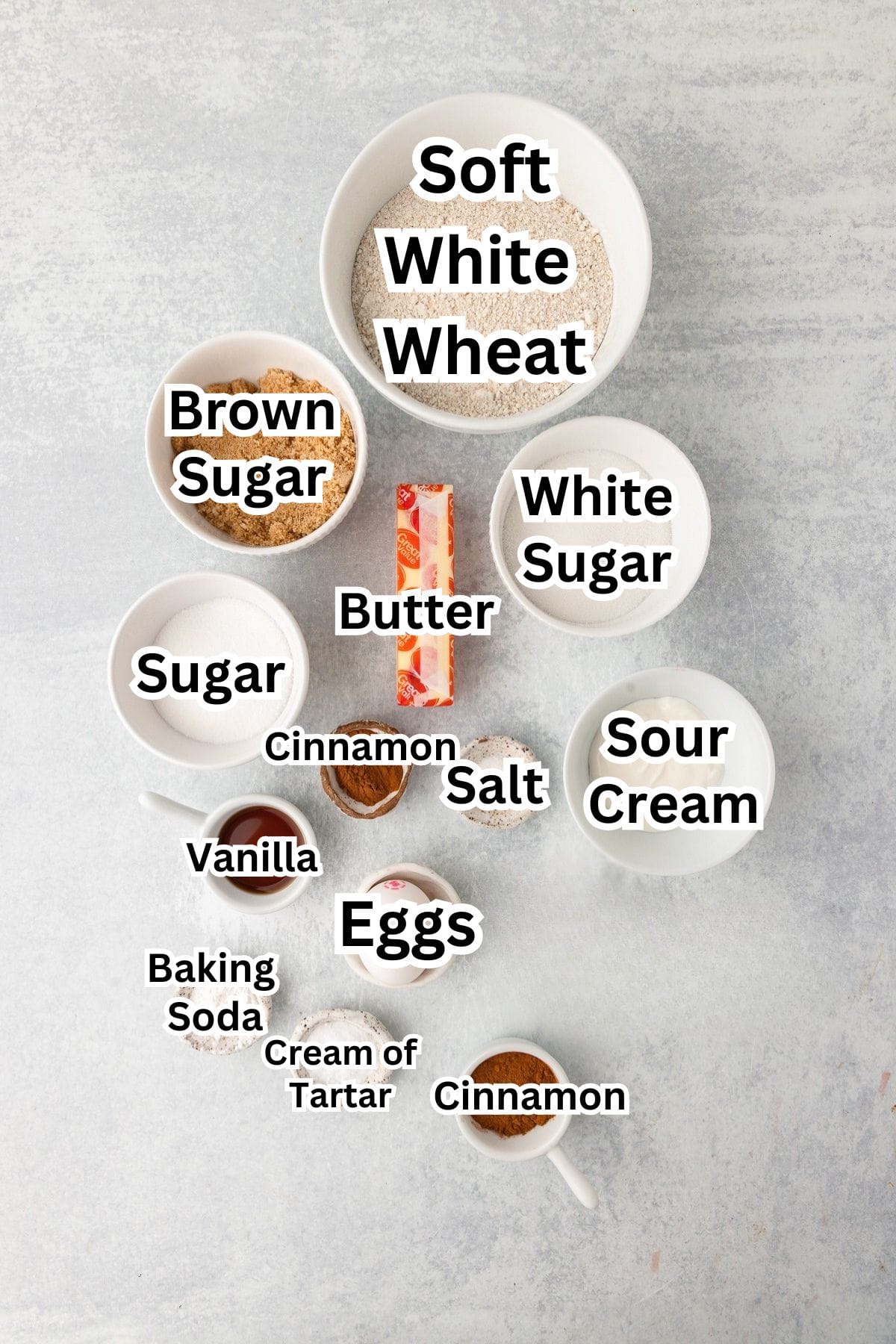 Ingredients for snickerdoodles including soft white wheat, brown sugar, butter, eggs, and cinnamon.