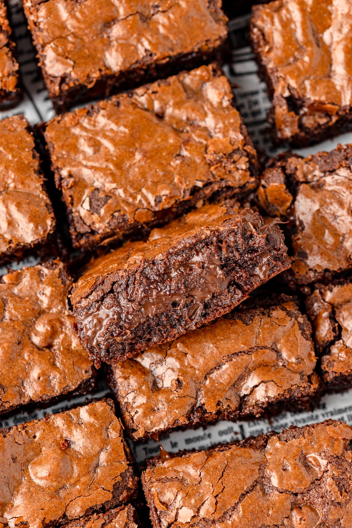 Fudgy spelt brownies with a cracked, crispy top and rich, moist interior.