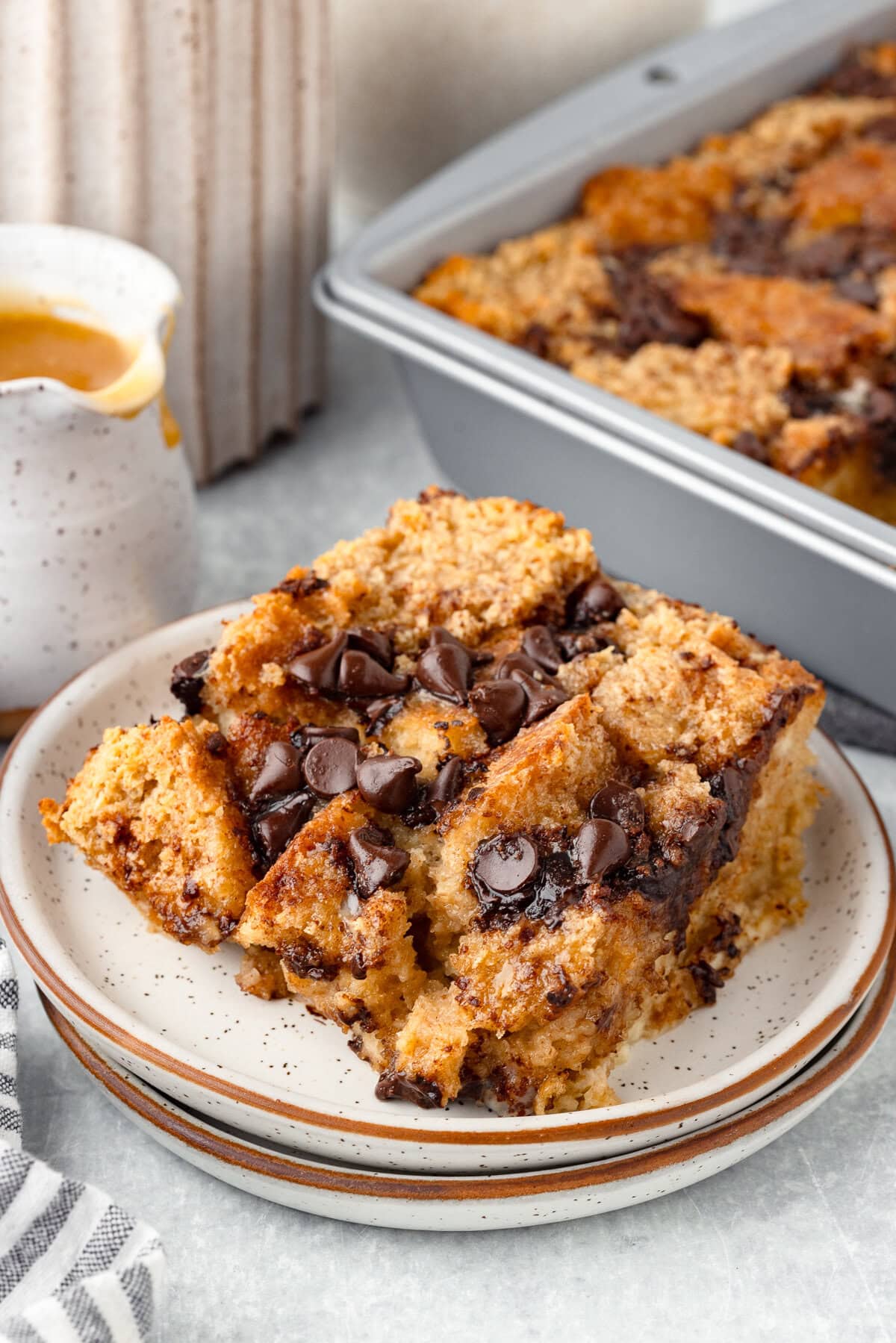 Biscuit bread pudding with chocolate chips and crispy topping.