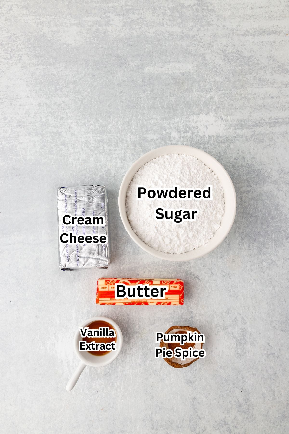 How to make pumpkin spice cream cheese frosting ingredients shown.